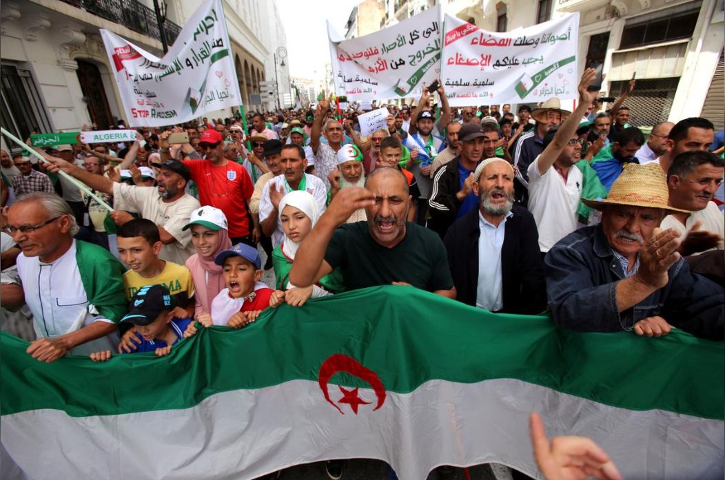'You all go' - thousands of Algerians demonstrate for political reforms
