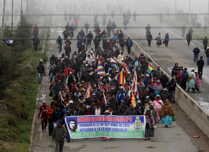 Bolivia's rival factions pursue dialogue to douse anger on streets