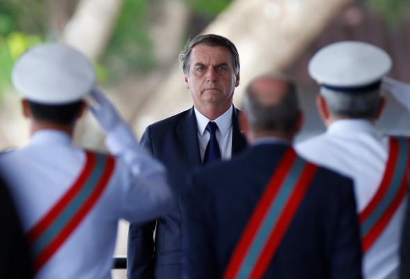 Brazil's Bolsonaro pledges action to 'restore democracy' in Venezuela