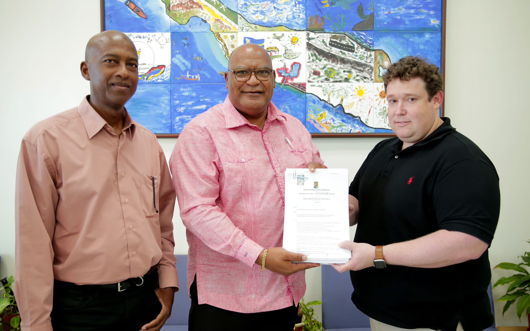 Minister Cooper contributes to the construction of 11 homes in the Coral Estate area