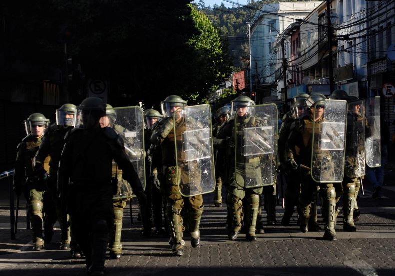 Chile's Pinera to crack down on vandals, looters