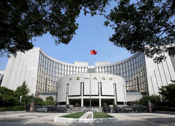 China's central bank lifts yuan transfer limits for Macau