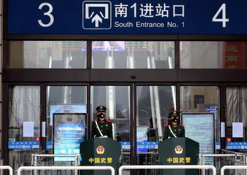 China orders 'unprecedented' lockdown of two cities at virus epicenter