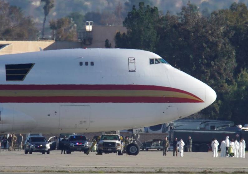 China evacuations begin as WHO voices concern about virus spread