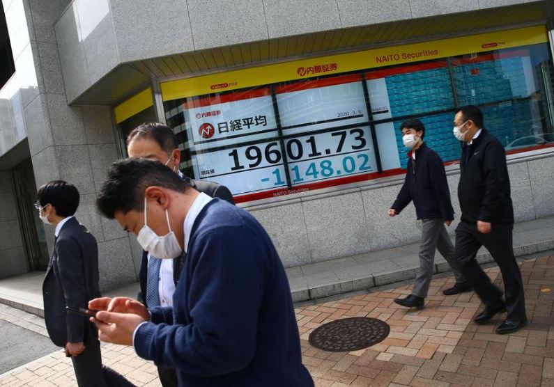 Coronavirus shock, oil price plunge pummel world stocks