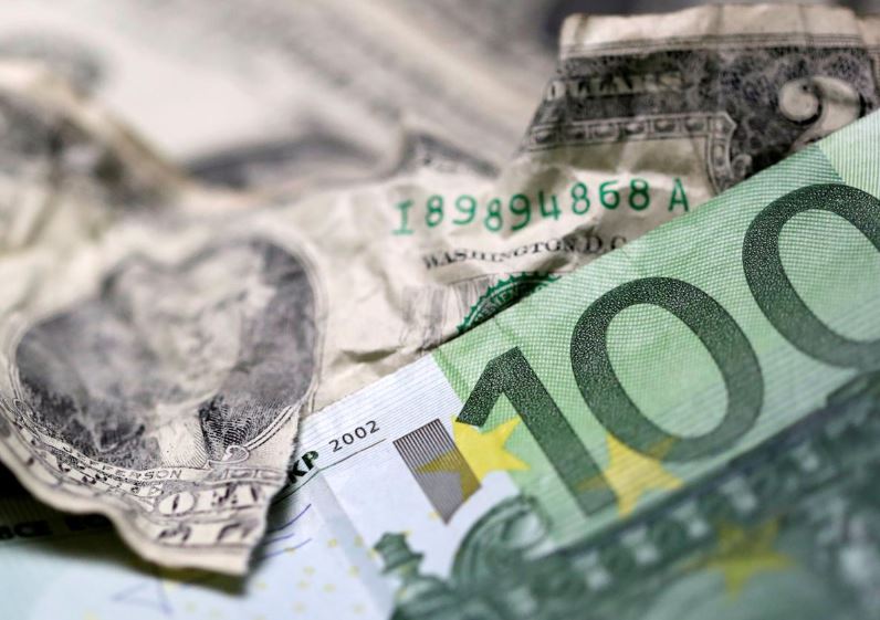 Dollar rises as weak German data hurts euro