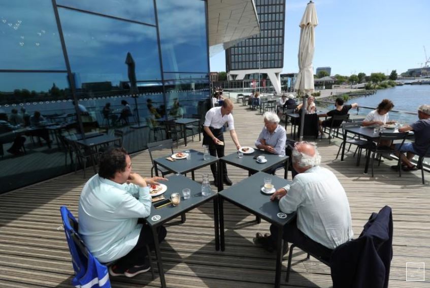 Dutch bar terraces fill quickly as lockdown ends
