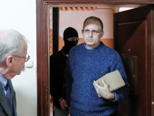 Ex-U.S. marine held by Russia on spying charge complains of threats