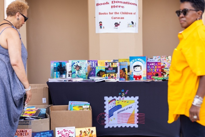 African American Cultural Cruise ‘Festival at Sea’ Celebrates 33 Years with Donation of 1,000 Books to Children in Curaçao