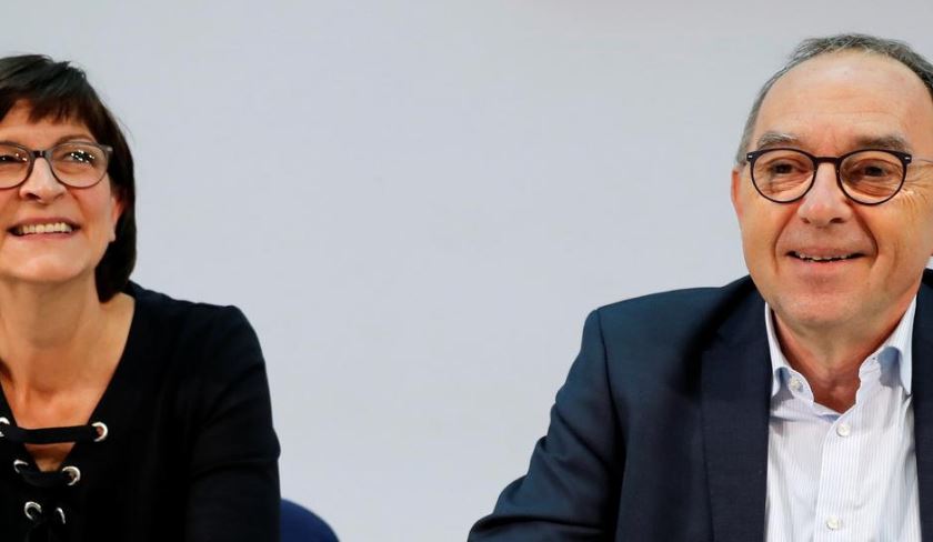 Germany's SPD backs cautious new approach that could save Merkel government