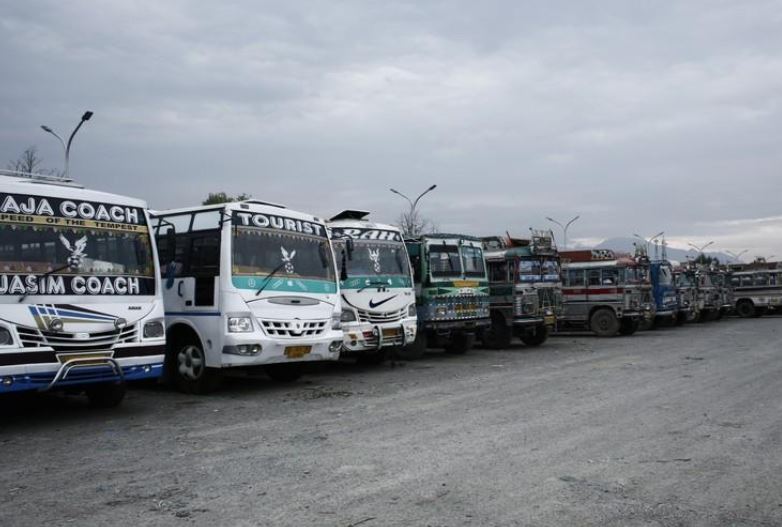 India imposes curfews in Kashmir after clashes during religious procession