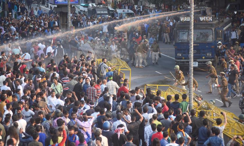 India's parliament passes citizenship law, protests flare