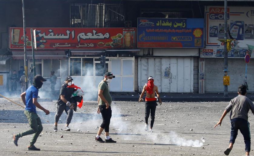 Iraqi police open fire, use tear gas and water cannon to disperse Baghdad protests