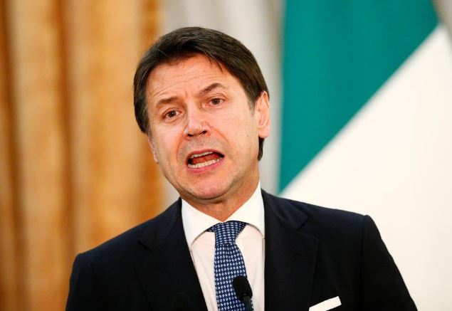Italy PM defends reform of euro zone bailout fund but seeks concessions