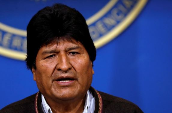 Bolivia's Morales resigns after protests, lashes out at 'coup'