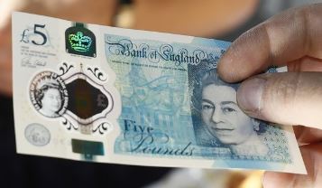 British pound drops as Brexit talks enter crucial week