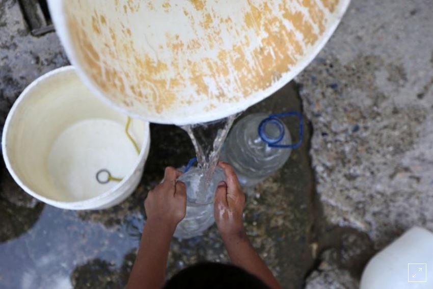 For Venezuelans, a key obstacle for handwashing during pandemic - no running water