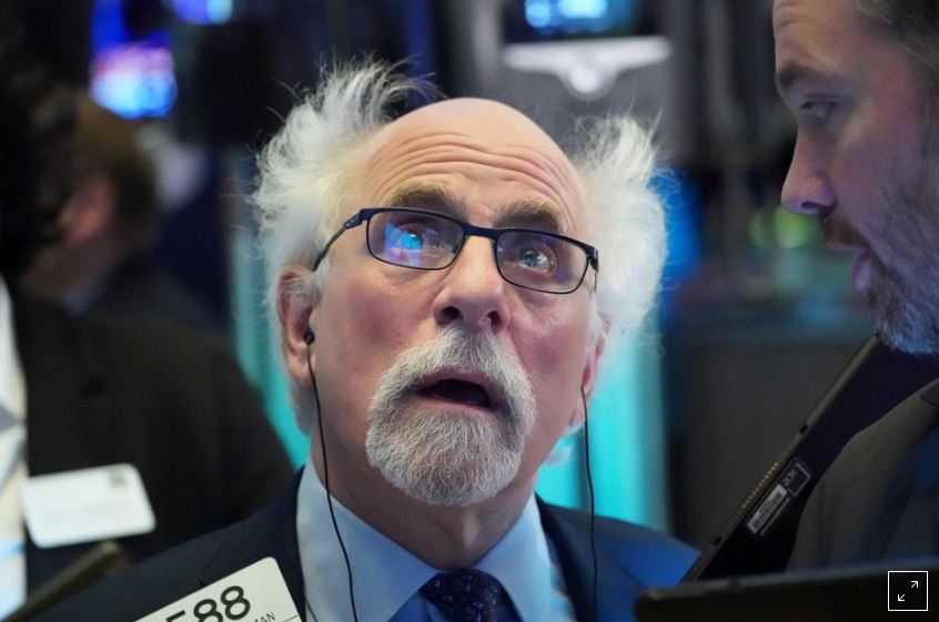 Wall Street clobbered as crude plummets, virus crisis deepens