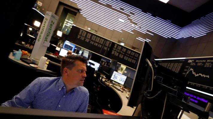 World shares slip and bond yields fall, all eyes on central banks