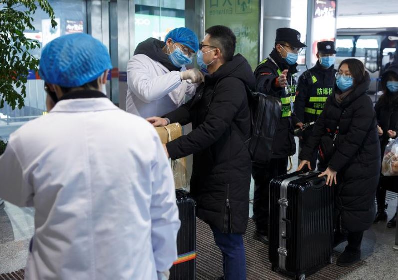 Trump offers China 'any help' as virus toll grows, markets reel