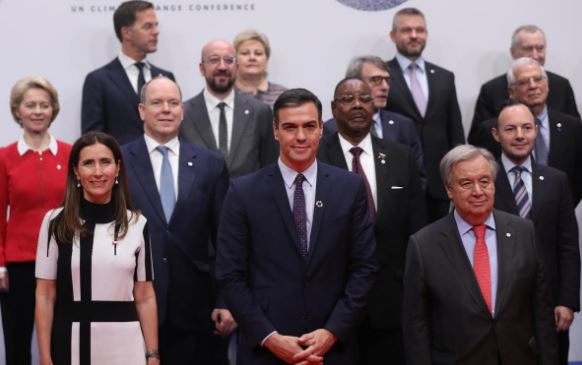 U.N. chief opens climate summit with call for hope over 'surrender'