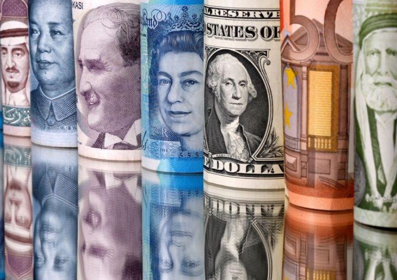 Dollar slips against euro, gains on yen on month-end rebalancing