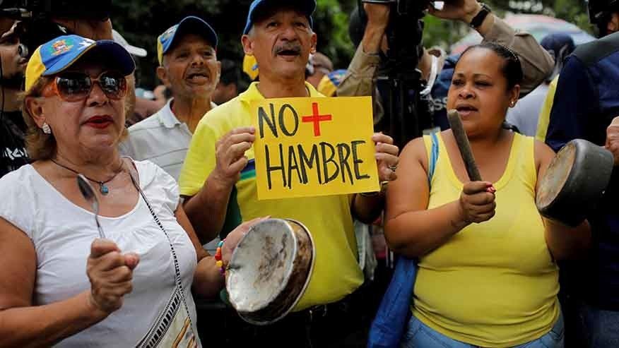 Venezuela to distribute food to poor Colombians amid aid tension