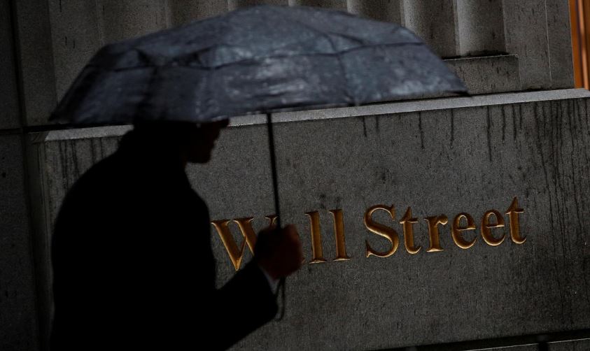 Wall St. posts record highs following China data, trade deal