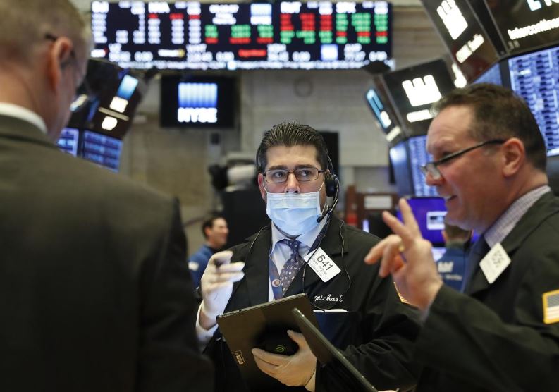 Wall Street falls as U.S. virus cases pass 85,000