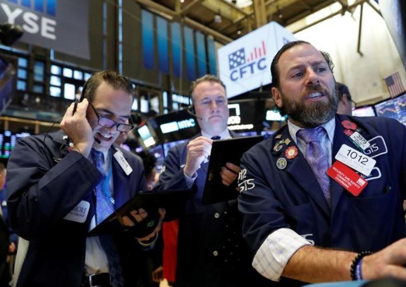 With market at record highs, eyes on reports from chipmakers